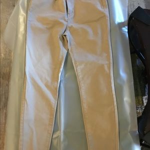 Gently used women’s High Rise Wax Butt,I love you tan jeans.